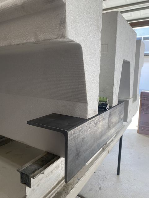 Prototype hardware at the base of the form.